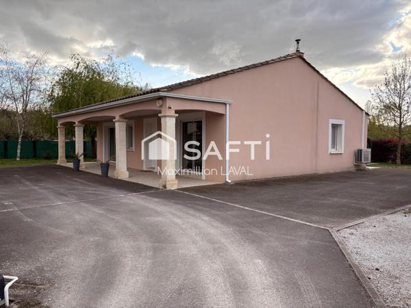 Maison calme avec carport et 2 dépendances.