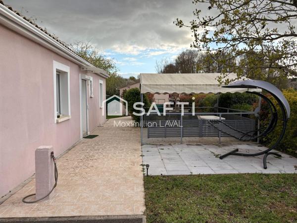 Maison calme avec carport et 2 dépendances.