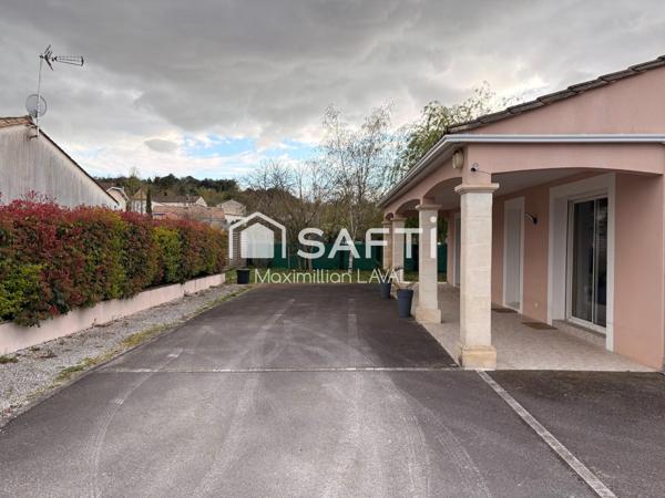 Maison calme avec carport et 2 dépendances.