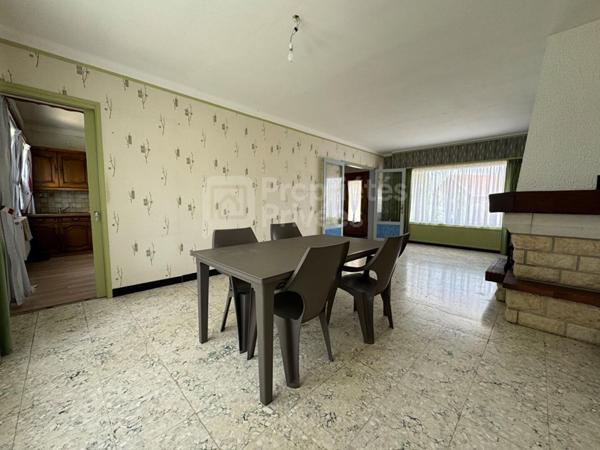 Maison individuelle semi plain-pied avec vue dégagée - Beau potentiel