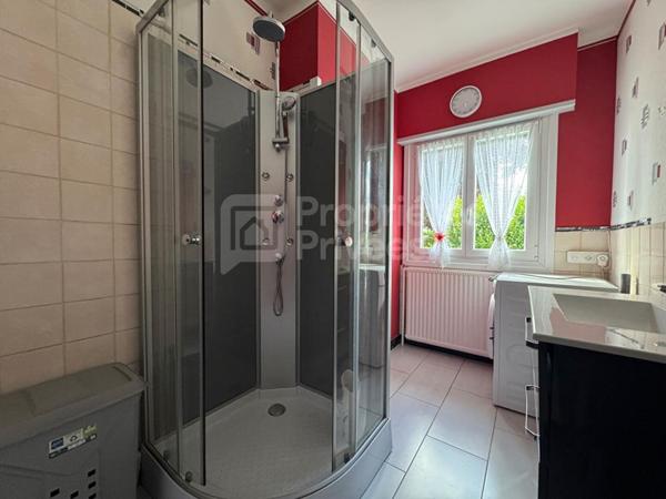 Maison individuelle semi plain-pied avec vue dégagée - Beau potentiel