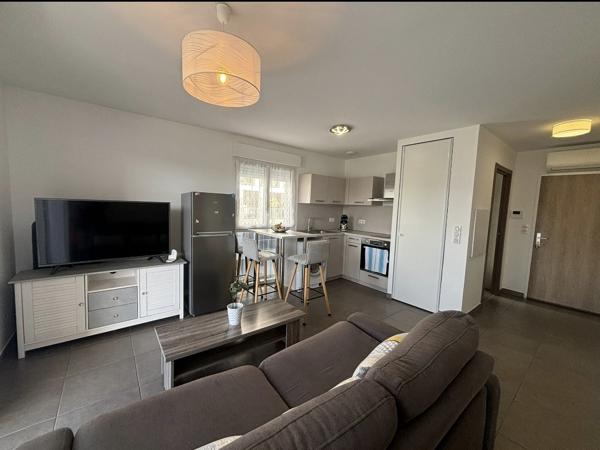 Appartement lumineux de 31.50m2 avec terrasse de 12m2 + garage et place de parking dans résidence récente