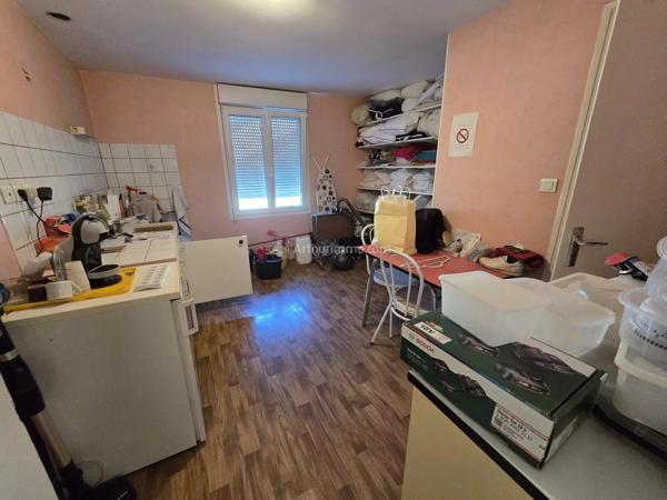 Vente                                                      Immeuble
                        
                                                            à Bourbonne-les-Bains
