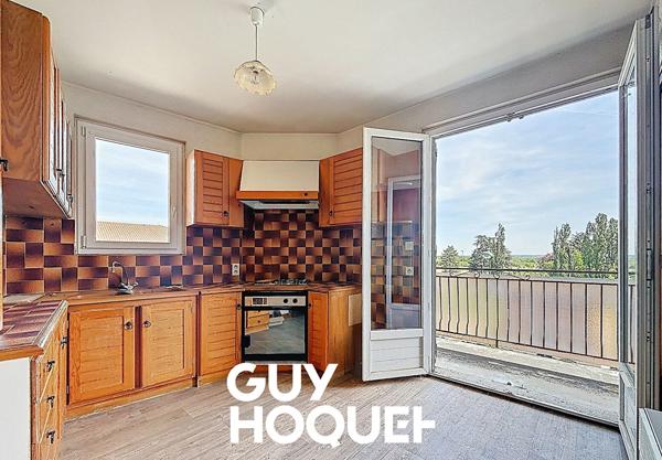 Immeuble avec Appartement type 4 + Atelier 178 m² + Garages et terrain de 330 m² environ - 71570 ROMANECHE-THORINS