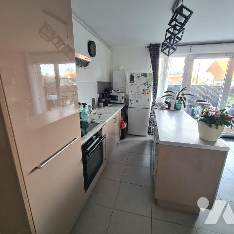 QUESNOY SUR DEULE Type 2 en rez-de-jardin avec un parking