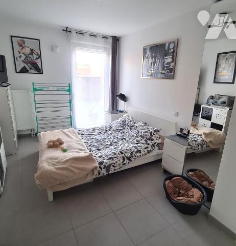 QUESNOY SUR DEULE Type 2 en rez-de-jardin avec un parking