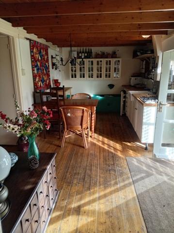 LONGÈRE HÉBERGEANT 2 HABITATIONS PLUS UNE MAISONNETTE SITUÉE AU CALME