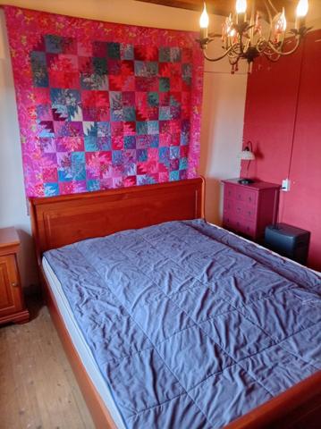 LONGÈRE HÉBERGEANT 2 HABITATIONS PLUS UNE MAISONNETTE SITUÉE AU CALME