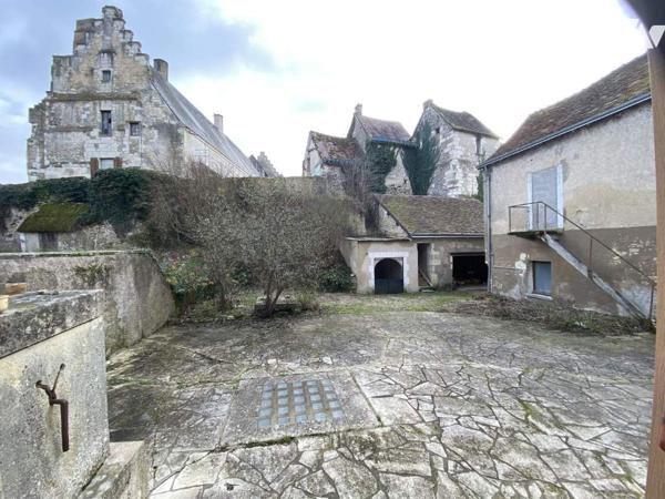 Centre ville, un bel ensemble immobilier composé de deux maisons d'habitation