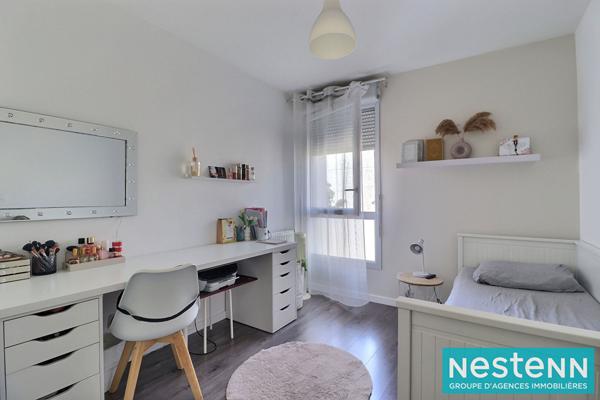 Appartement de type 4 de 78m² avec balcon et stationnement situé à Villeurbanne