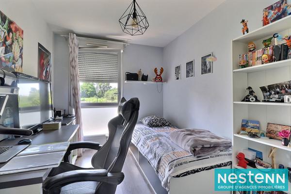 Appartement de type 4 de 78m² avec balcon et stationnement situé à Villeurbanne