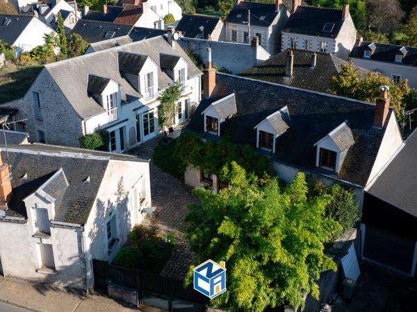 ENSEMBLE IMMOBILIER DE TROIS MAISONS AVEC 574M2 DE TERRAIN PROCHE TOUTES COMMODITÉS