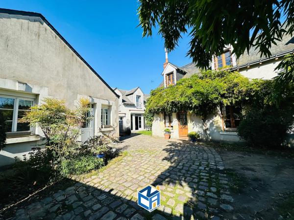 ENSEMBLE IMMOBILIER DE TROIS MAISONS AVEC 574M2 DE TERRAIN PROCHE TOUTES COMMODITÉS