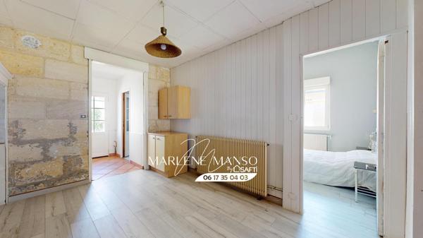 Maison en pierre 91 m² avec jardin et parking