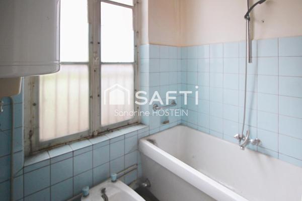 Appartement de 87m2 avec 3 chambres, cave et grenier