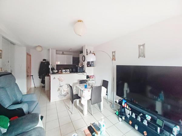 Un appartement T2-terrasse-parking-ascenseur-