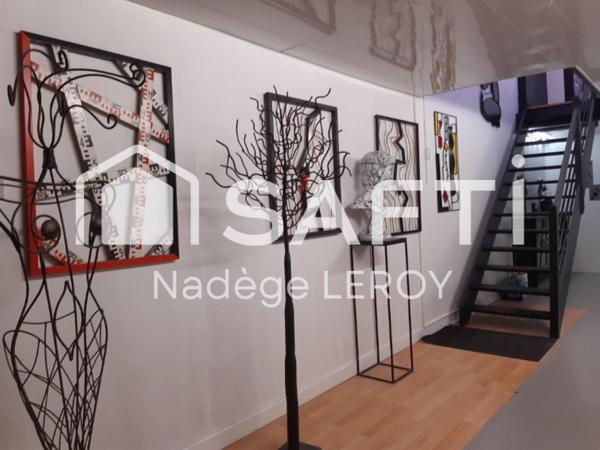 Lot de 5 appartements dont 4 meublés, atelier, terrasses.