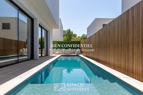 Maison d’architecte contemporaine et son couloir de nage
