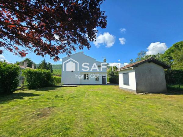 Idéalement située, proche commodités avec jardin et garage