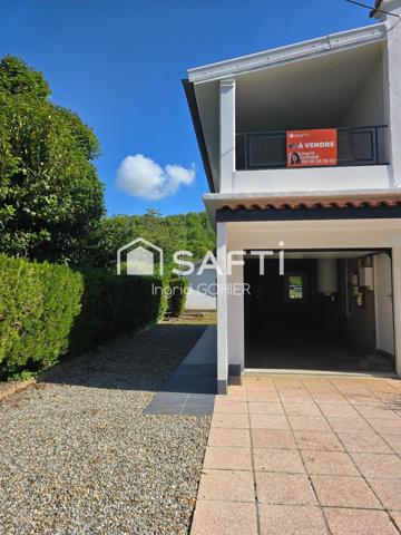 Idéalement située, proche commodités avec jardin et garage