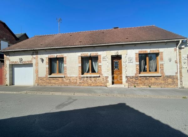 Maison individuel 4 chambres garage et batiments.