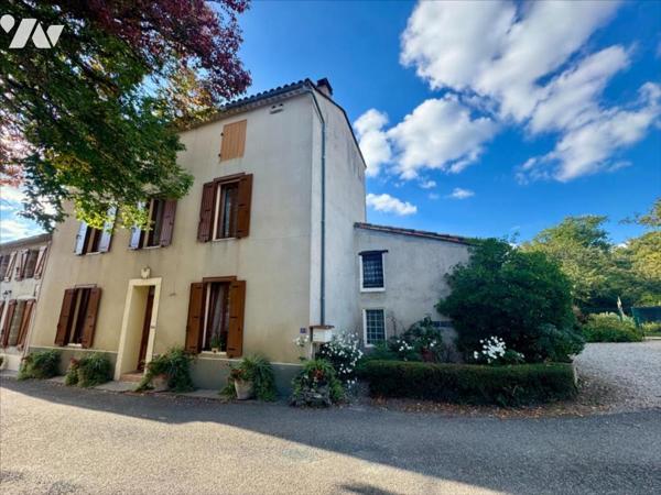 Au calme d'un hameau, habitation avec garage et jardin