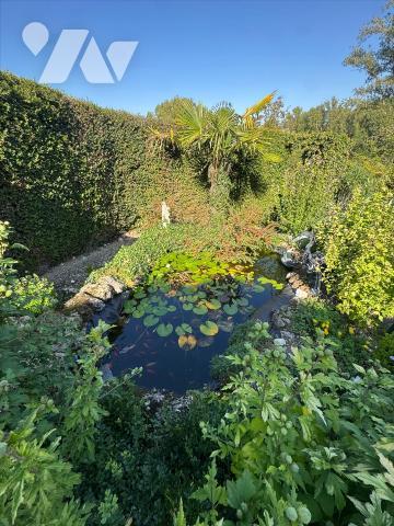 Au calme d'un hameau, habitation avec garage et jardin