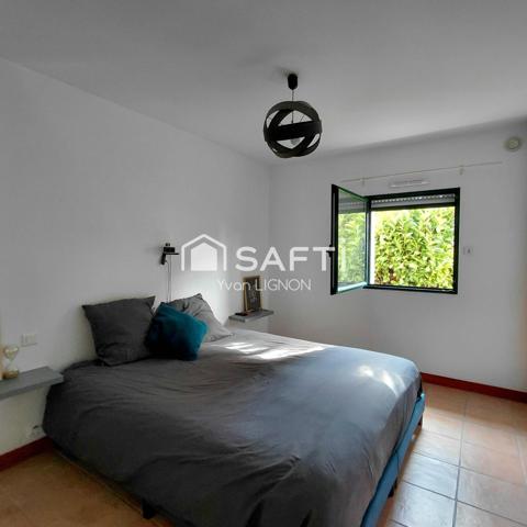 Maison familiale de 2003 avec 4 chambres, garage et jardin