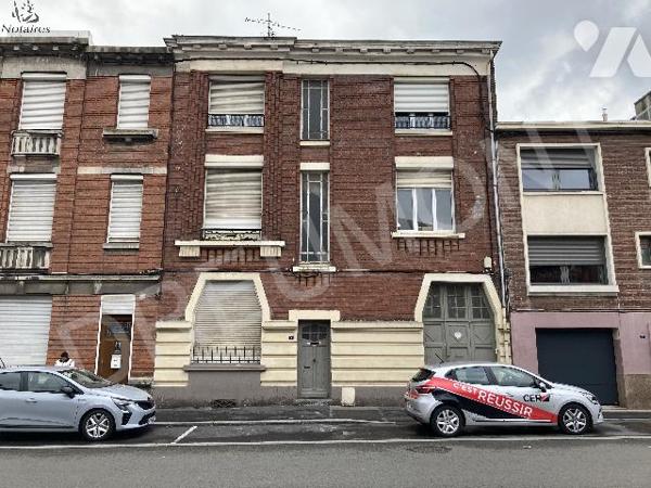 Vente d'un immeuble sur trois niveaux comprenant 9 logements.