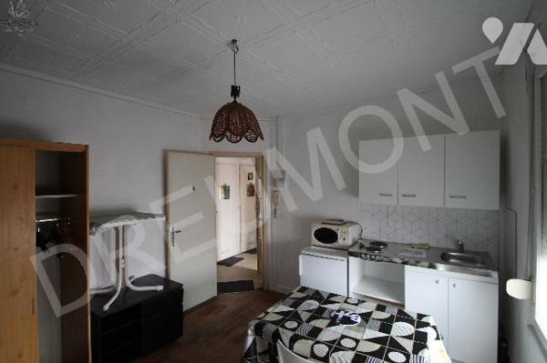 Vente d'un immeuble sur trois niveaux comprenant 9 logements.