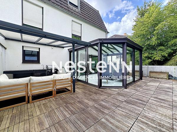 Grand studio avec véranda, terrasse, cave et parking