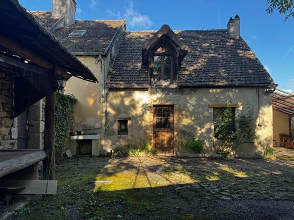 Maison en pierres avec charme et potentiel