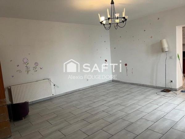 IMMEUBLE avec appartement et restaurant loué