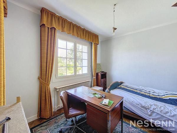 A Vendre Maison de caractère en pierre de 317 m² avec grand garage et jardin arboré à Condom.