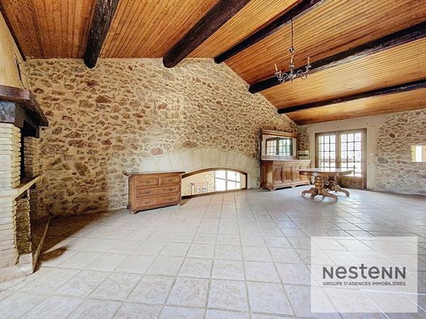 A vendre maison en pierre de 225 m² avec 7 chambres sur terrain arboré de 530 m² à Montpellier