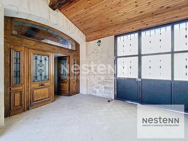 A vendre maison en pierre de 225 m² avec 7 chambres sur terrain arboré de 530 m² à Montpellier