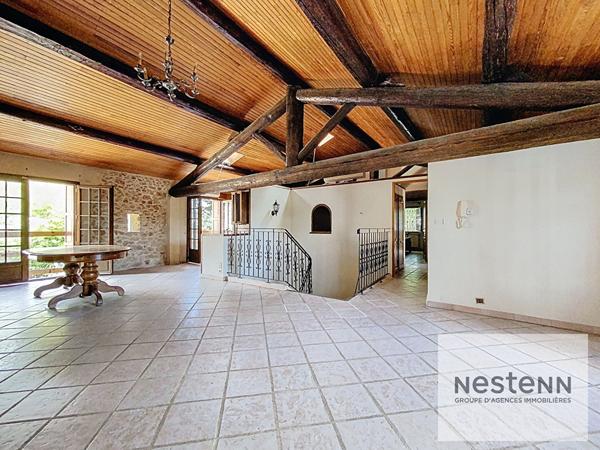 A vendre maison en pierre de 225 m² avec 7 chambres sur terrain arboré de 530 m² à Montpellier