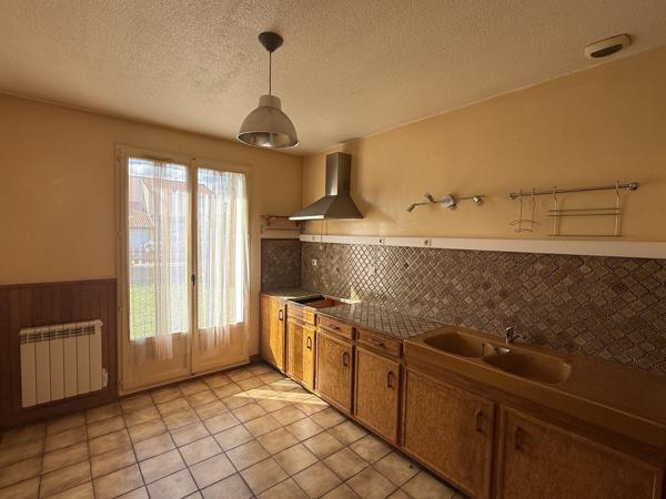 Maison avec jardin et garage attenant