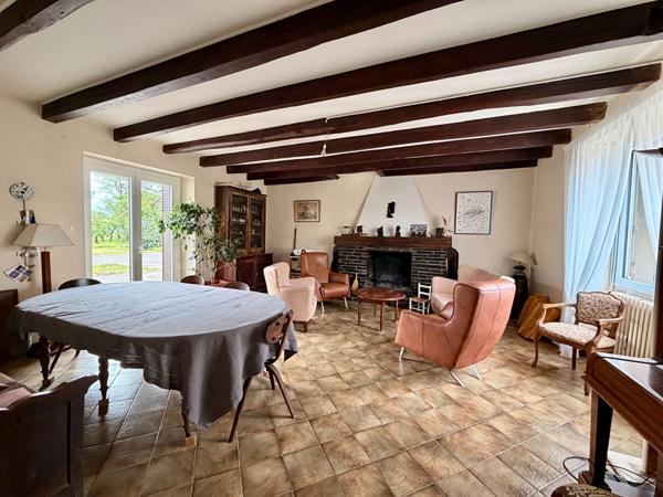 Maison familiale spacieuse avec verger.