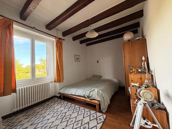 Maison familiale spacieuse avec verger.