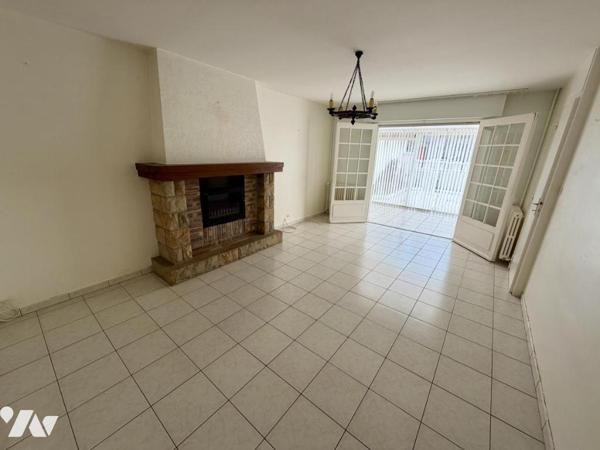 Maison en centre bourg avec garage et jardin