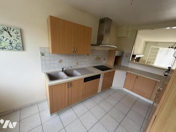 Maison en centre bourg avec garage et jardin