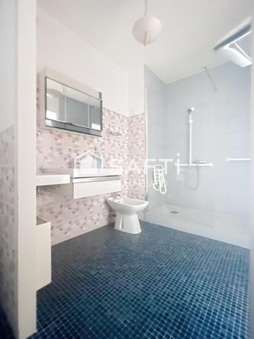 Appart T2 de 53 m² , avec balcon, place de parking