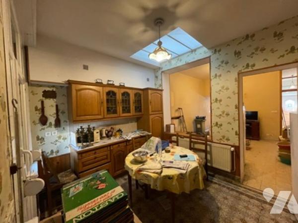 UNE MAISON A USAGE D'HABITATION