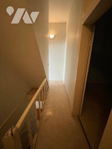 UNE MAISON A USAGE D'HABITATION