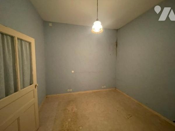 UNE MAISON A USAGE D'HABITATION