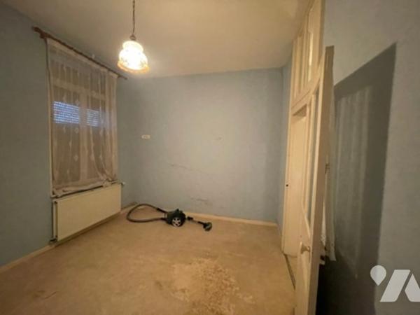 UNE MAISON A USAGE D'HABITATION