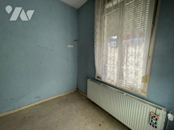 UNE MAISON A USAGE D'HABITATION