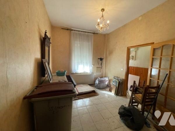 UNE MAISON A USAGE D'HABITATION