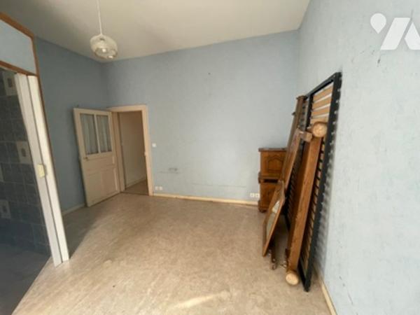 UNE MAISON A USAGE D'HABITATION